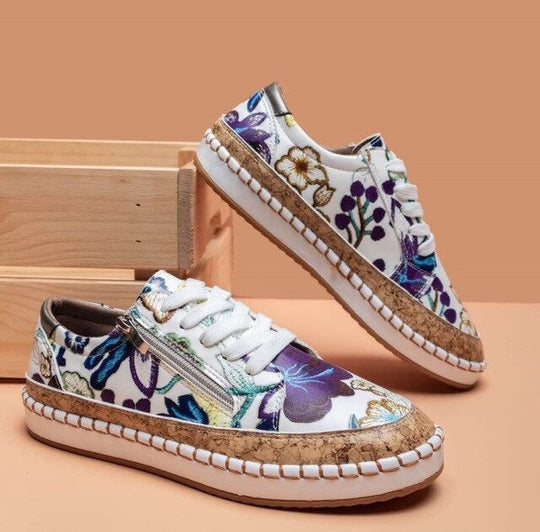 Santorini bloemen sneaker trend der seizoen