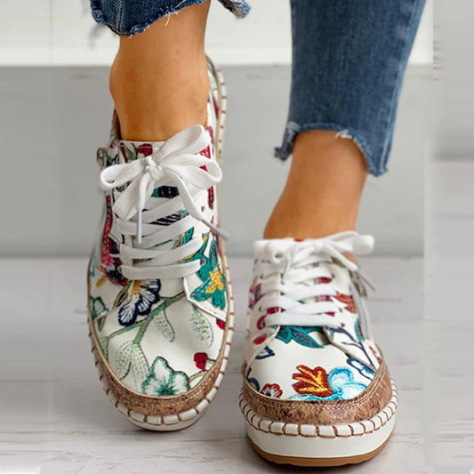 Santorini bloemen sneaker trend der seizoen